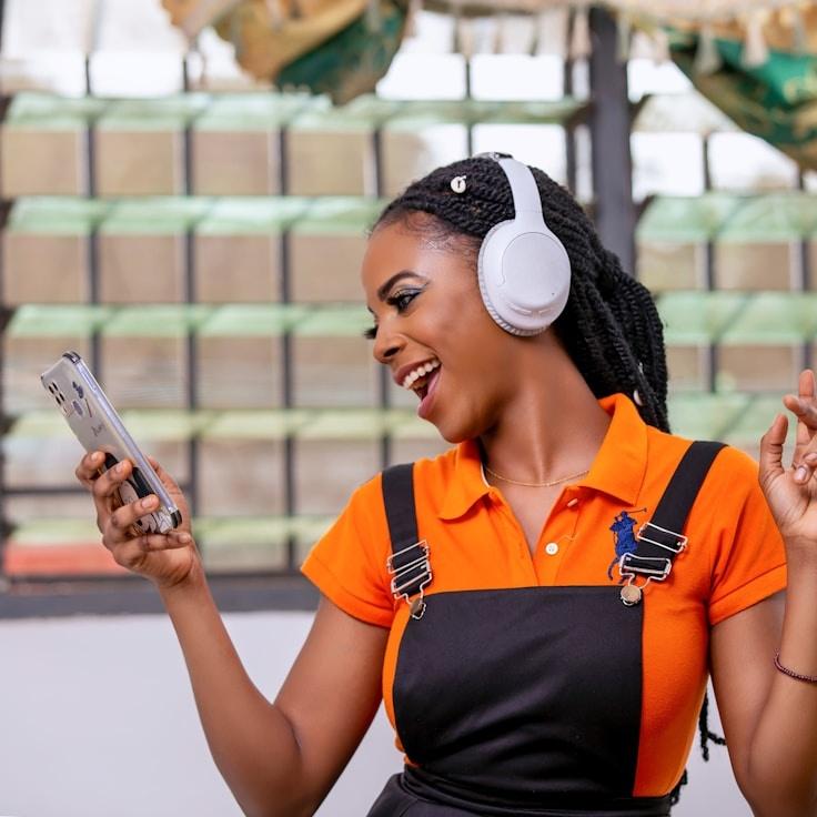 Kaveri Mehta, Lead Design Curator at Orbit Forest Press, reviewing corporate floral arrangements